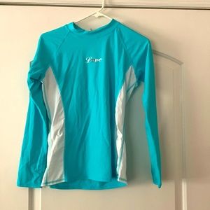 Womens blue and white, NWT rashguard long sleeved